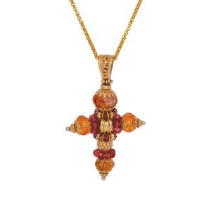 cross pendant set with citrine and garnet beads