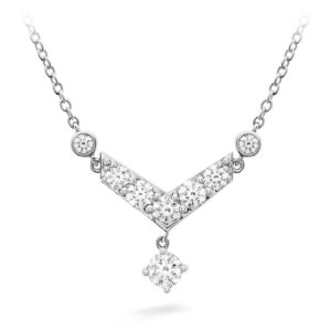 white gold necklace in a v shape with a dangle set with round brilliant diamonds