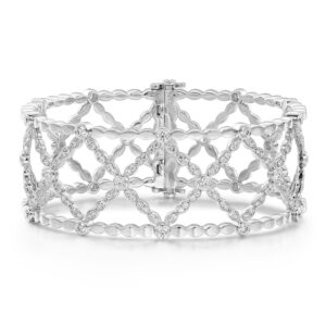 white gold wide cuff with a diamond motif set with round brilliant diamonds