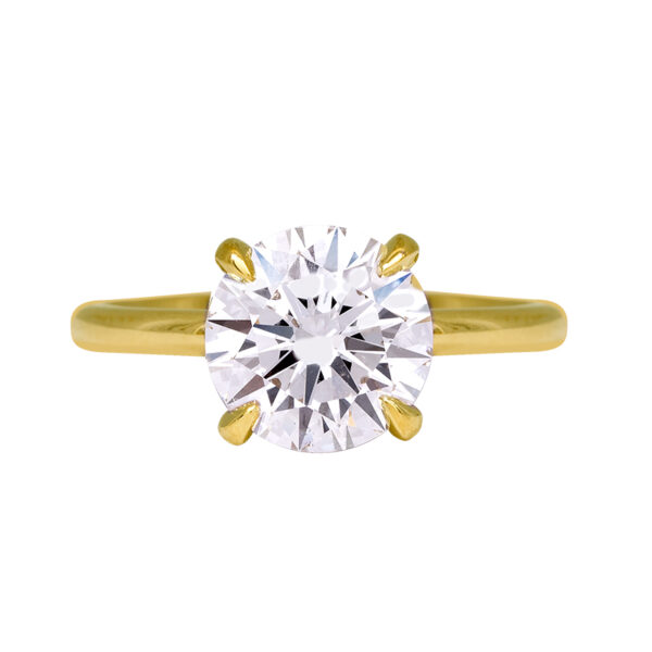 yellow gold solitaire engagement ring set with a round brilliant diamond