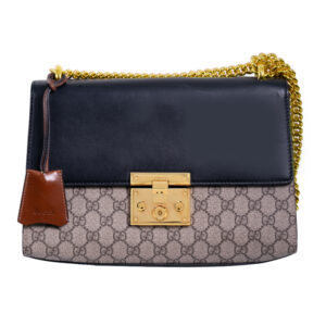 gucci handbag with black leather and GG supreme canvas and gold tone details