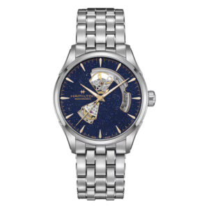 stainless steel watch with a navy blue skeleton dial