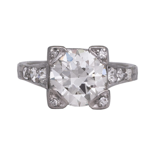 antique platinum set with an old European cut diamond with diamonds set in the prongs and band