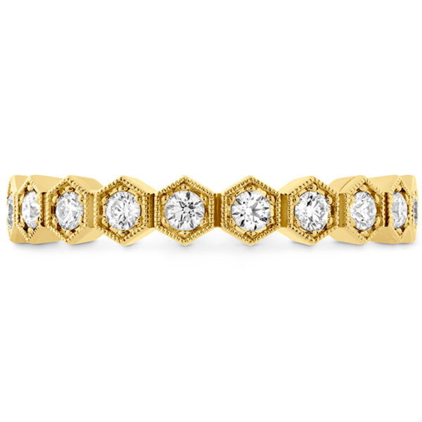 yellow gold band with hexagon bezels set with round diamonds