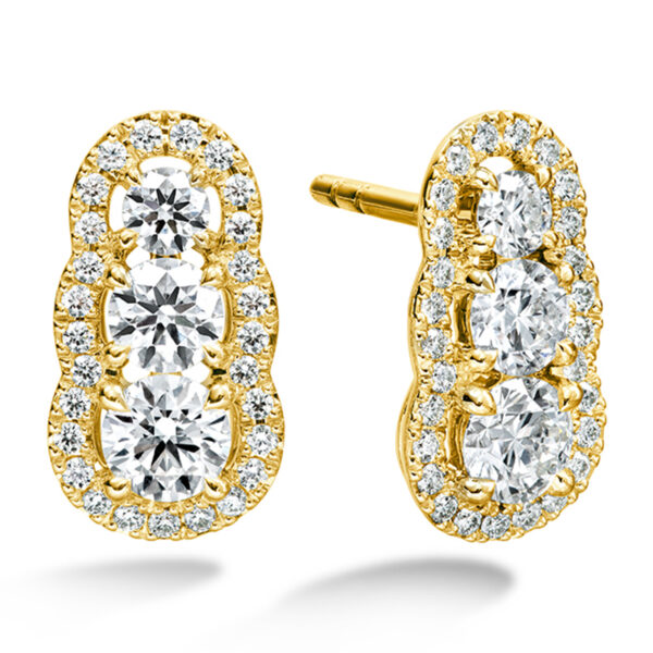 yellow gold earrings set with 3 round diamonds stacked vertically with an integrated halo