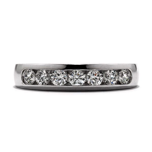 platinum channel set band set with 7 round diamonds