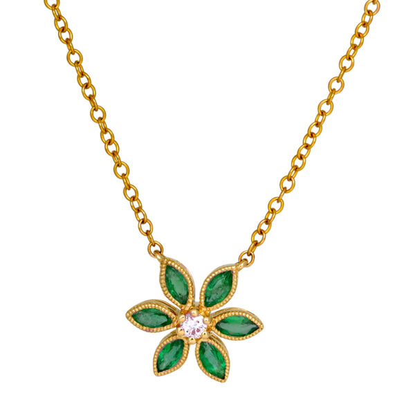 yellow gold flower pendant centered with a small round brilliant diamond surrounded by 6 marquise emeralds
