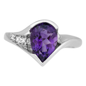 white gold ring with a pear amethyst and a few small diamonds on one side