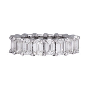 white gold eternity ring set with emerald cut diamonds