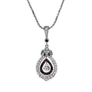 white gold pear shaped pendant set with black and white diamonds