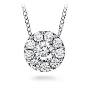 white gold round pendant centered with a round diamond surrounded by a halo of diamonds