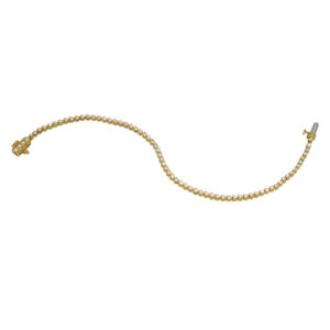 yellow gold tennis bracelet set with round brilliant diamonds