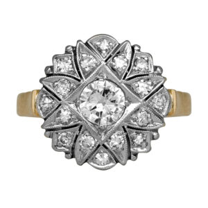 yellow and white gold flower motif halo ring set with round and single cut diamonds
