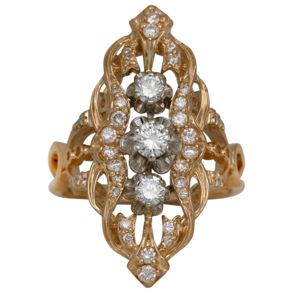 yellow gold cut out elongated ring set with round brilliant diamonds