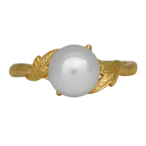 yellow gold ring with leaf motif set with a white pearl