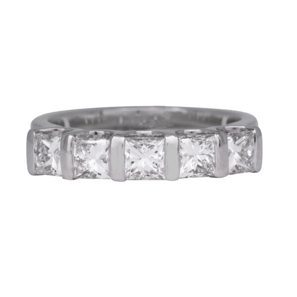 white gold band channel set with princess diamonds