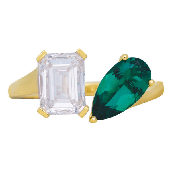 yellow gold toi et moi ring with an emerald cut diamond & pear cut emerald