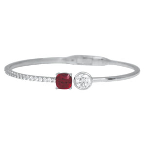 white gold bracelet set with a round ruby, round diamond and small round diamonds