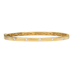 gold bangle set with round diamonds