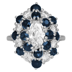 white gold double halo ring with a marquise center diamond surrounded by alternating round blue sapphire and white diamonds
