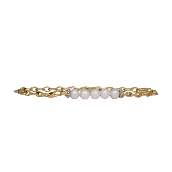 yellow gold bracelet with pearls and small round diamonds