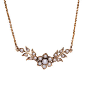 yellow gold floral necklace set with seed pearls