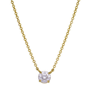 yellow gold solitaire pendant set with a small round brilliant diamond