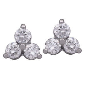 white gold cluster earrings set with 3 round diamonds each