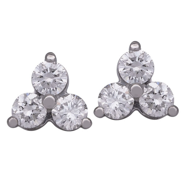white gold cluster earrings set with 3 round diamonds each