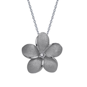 sterling silver plumeria pendant set with a round white sapphire