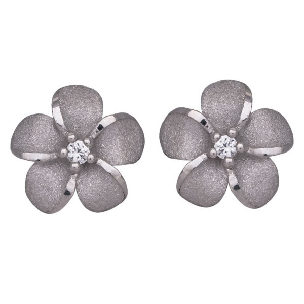 sterling silver plumeria earrings set with small round white sapphires