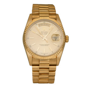 yellow gold rolex with a champagne dial