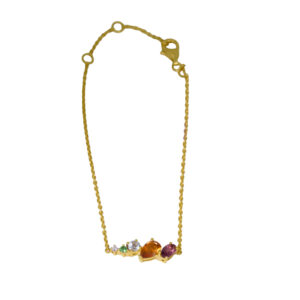 yellow gold cluster bracelet set with multiple shapes and colored gemstones