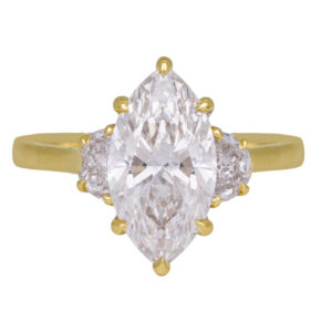yellow gold 3-stone ring centered with a marquise diamond flanked by half moon diamonds