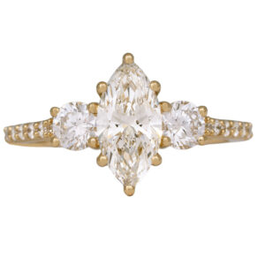 yellow gold 3-stone engagement ring set with a marquise and surrounded by round brilliant diamonds