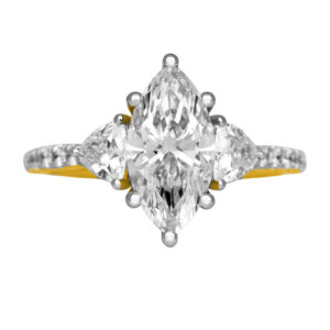 yellow gold 3-stone engagement ring set with marquise, trillion, and round brilliant diamonds