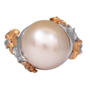 yellow and white gold pearl ring with small diamonds