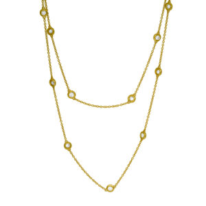 yellow gold station necklace set with round diamonds