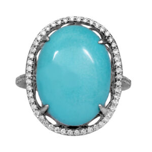 white gold halo ring set with a large cabochon turquoise surrounded by round brilliant diamonds