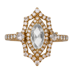 yellow gold ring centered with a rose cut marquise diamond surrounded by rose cut and round brilliant diamonds in the halo and band