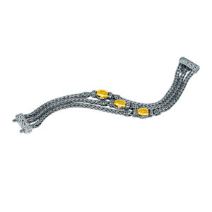 sterling silver and yellow gold triple chain bracelet