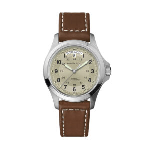 stainless steel watch with a beige dial and brown leather strap