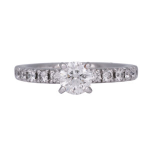 white gold engagement ring centered with a round brilliant diamond and round diamonds in the band