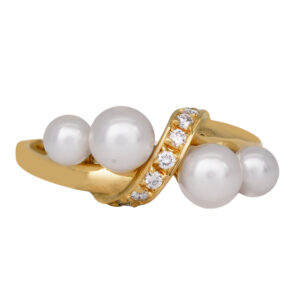 yellow gold crossover ring set with Akoya pearls and round brilliant diamonds