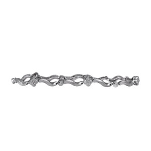 white gold s-link bracelet with clover stations set with round diamonds