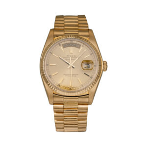 yellow gold Rolex with a champagne dial