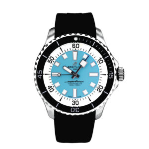 stainless steel watch with a white and blue dial and black bezel and black rubber strap