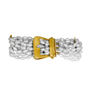 6-row oblong pearl bracelet with a yellow gold buckle set with round brilliant diamonds