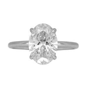 white gold solitaire engagement ring set with an oval diamond