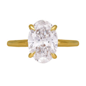 yellow gold solitaire engagement ring set with an oval diamond
